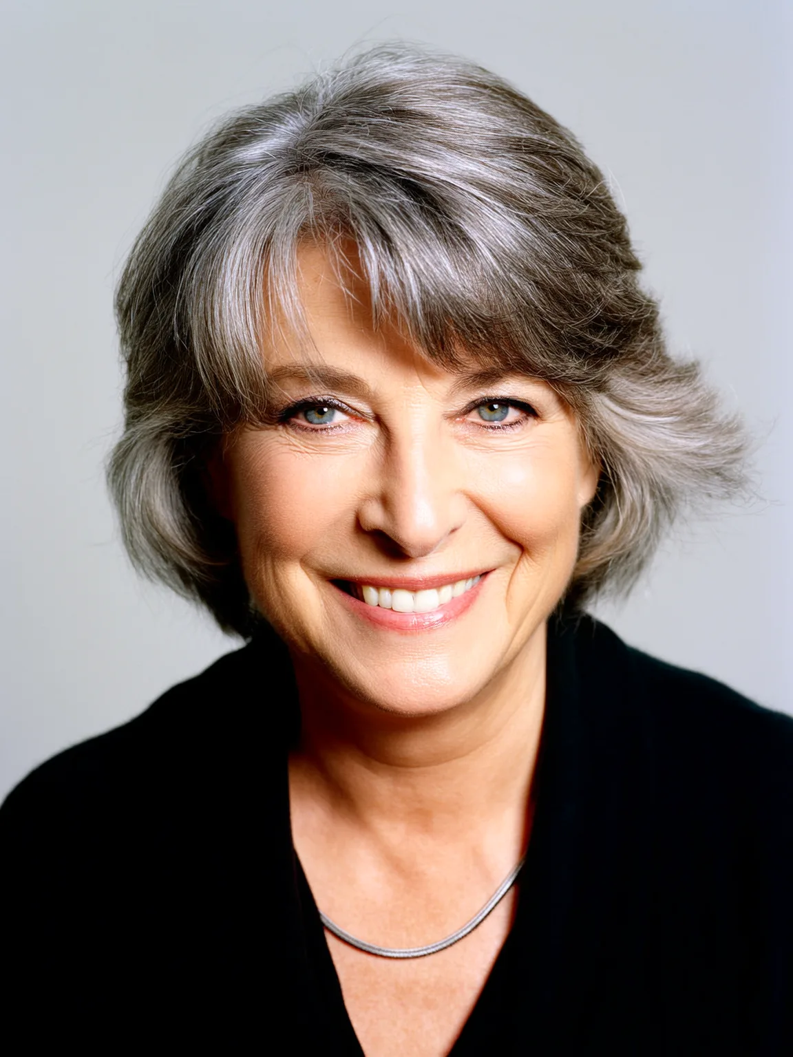Short Voluminous Textured Silver Frost Layers with Side-Swept Bangs